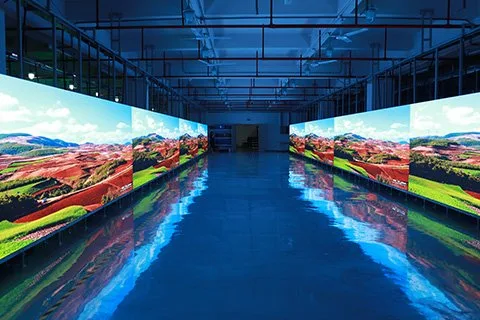 Assembled LED screens displaying test content on EagerLED's factory aging line