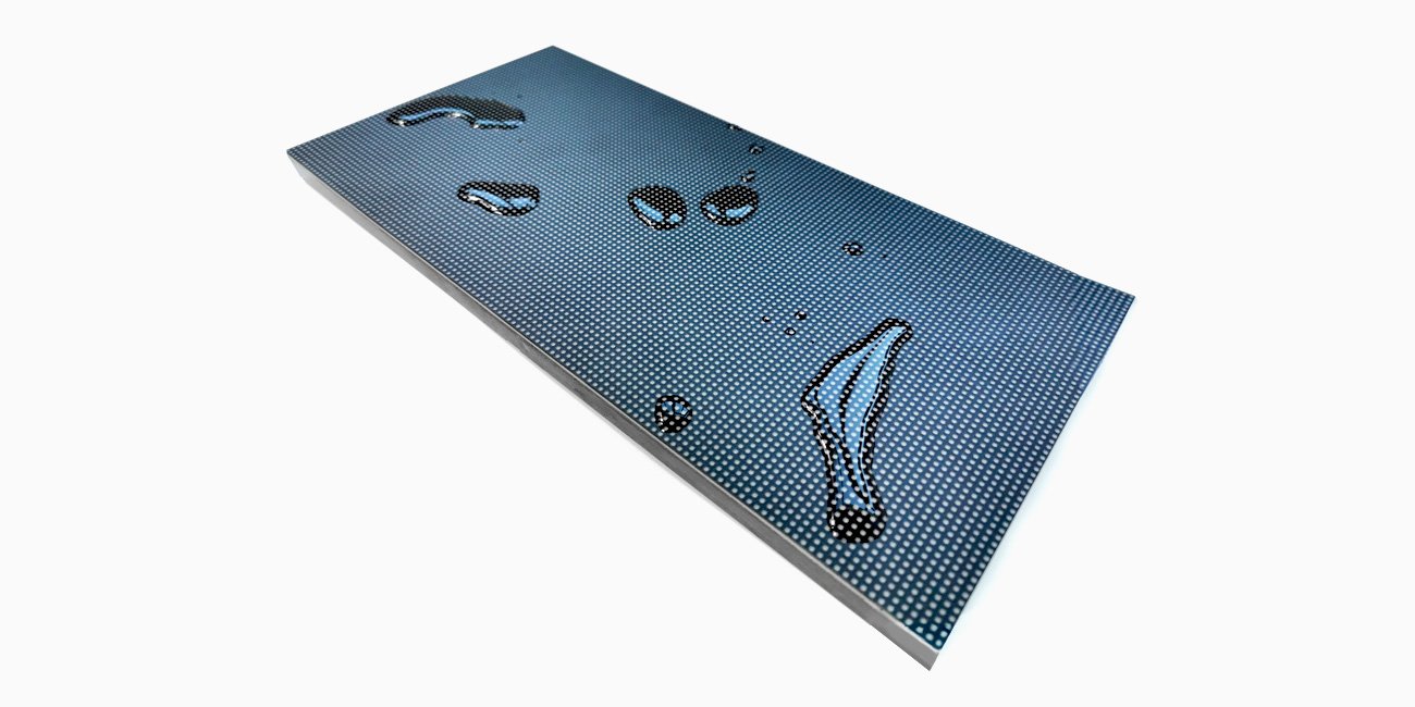 Close view of droplets on the encapsulated face of a GOB LED module